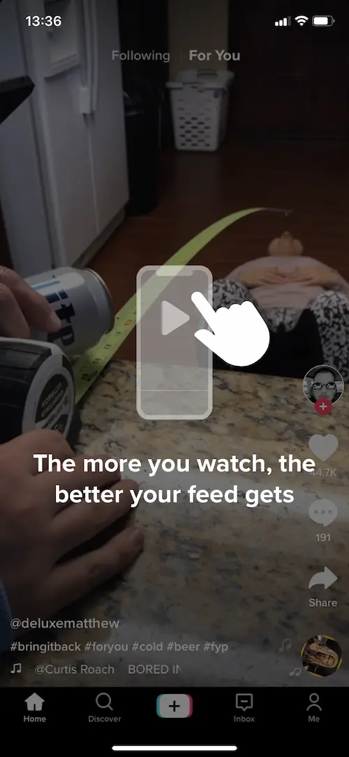 On the "for you" page of TikTok, a message pops up with a diagram saying "The more you watch the better the feed gets."